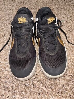 Nike Black and Gold Low-Top Sneakers